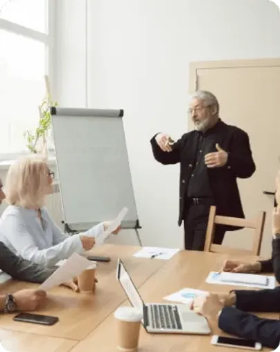 Senior leader facilitates ops framework business workshop