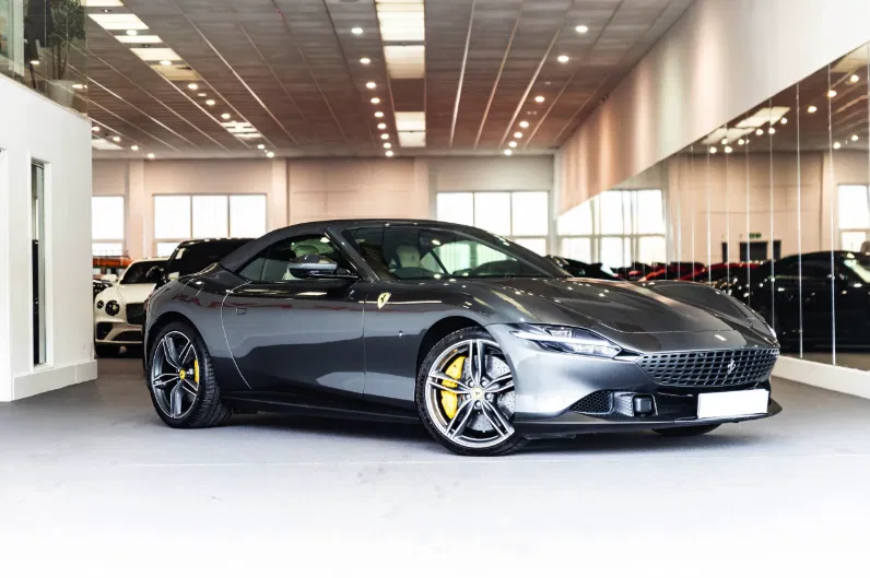 Ferrari Roma in metallic grey, representing the flexibility to upgrade or swap at any time