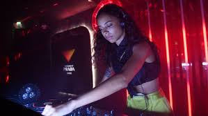 Female DJ at Event with Special Effects