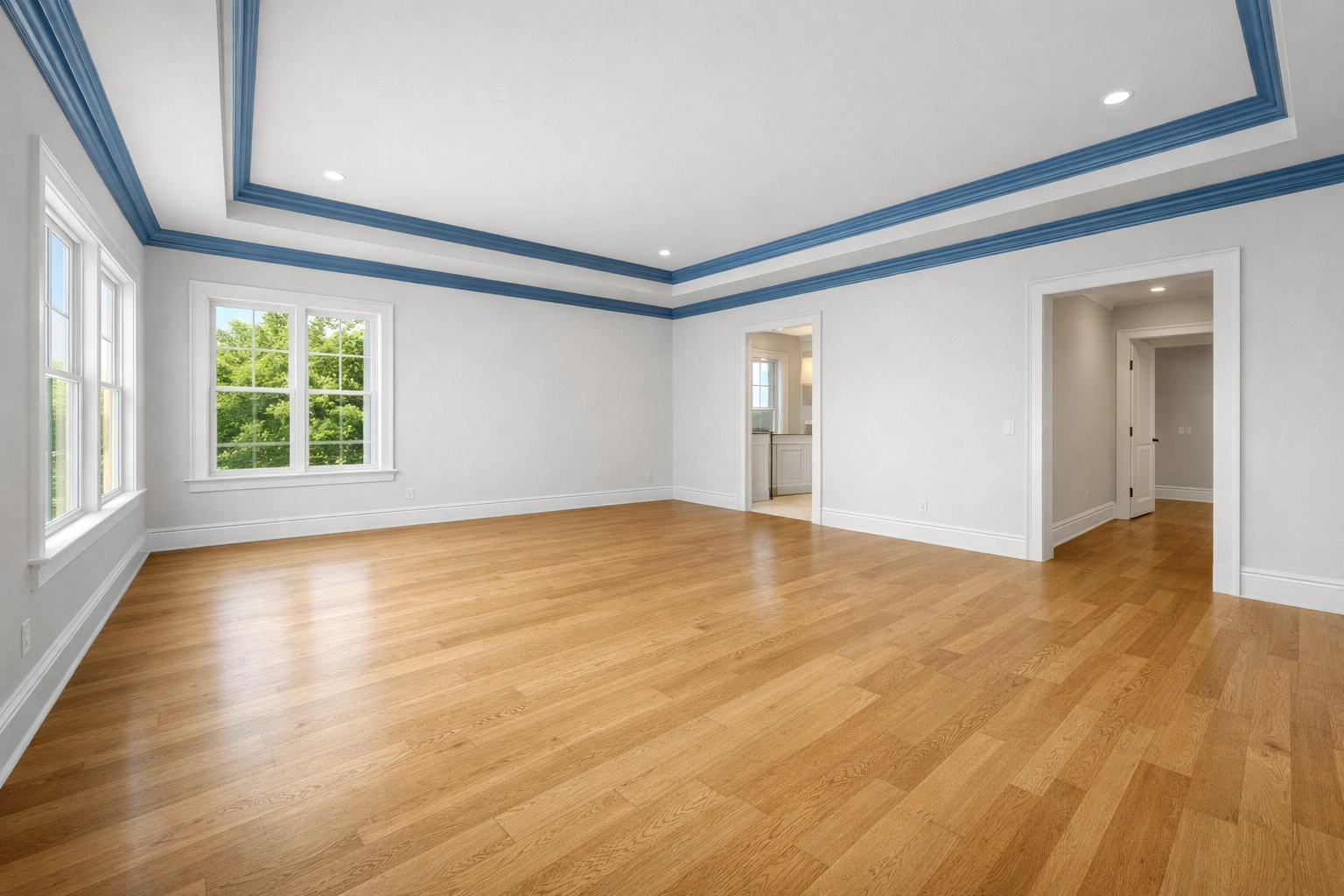 Pristine empty master bedroom featuring spotless hardwood floors after a residential cleaning Massachusetts service.