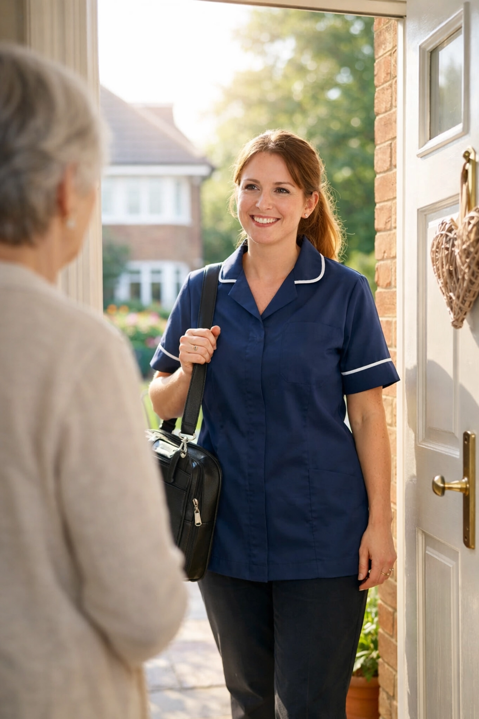 Professional caregiver arriving at a home for hospital to home transition support in Southampton.