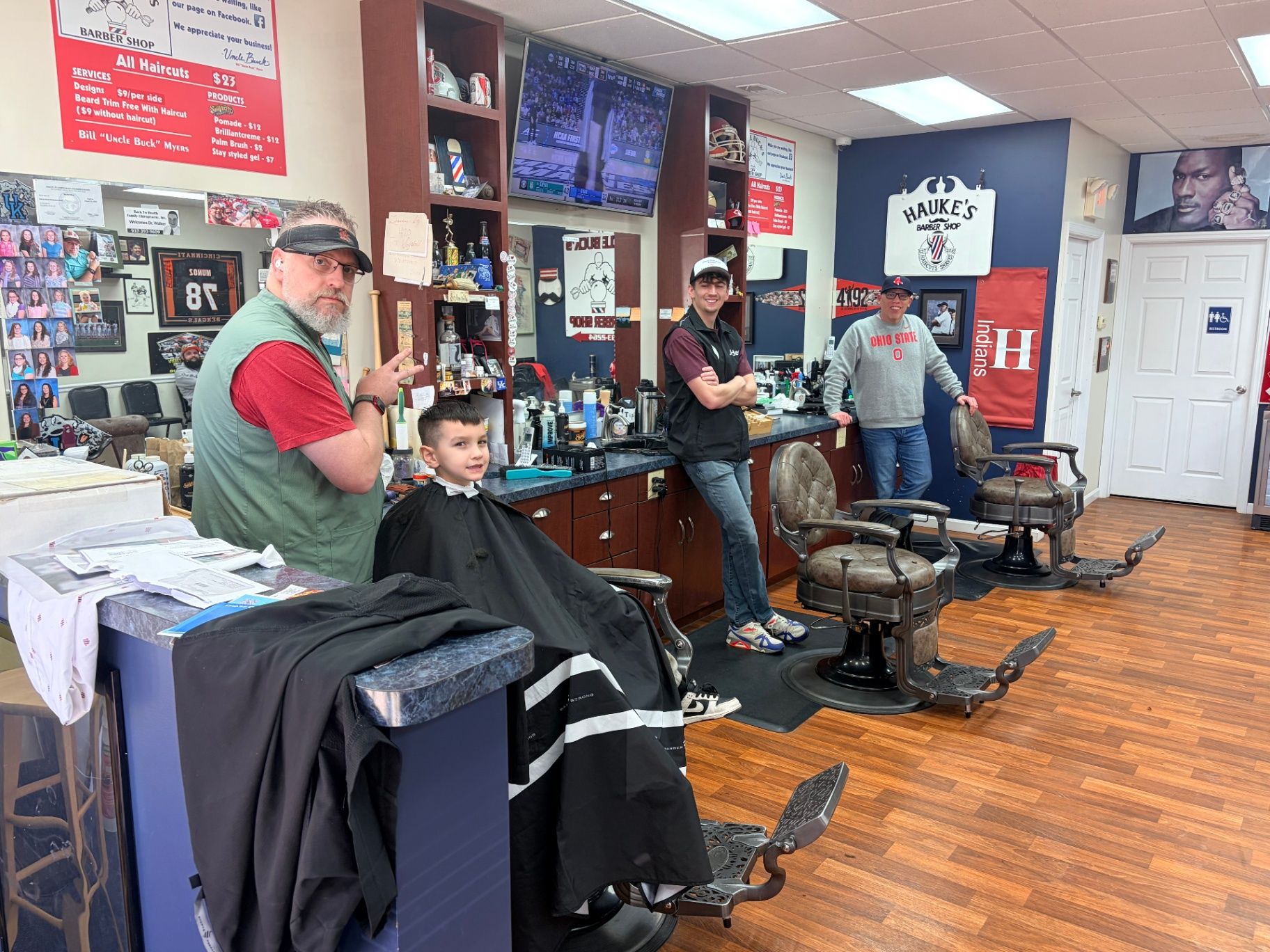 Bobby giving a haircut at Uncle Buck's
