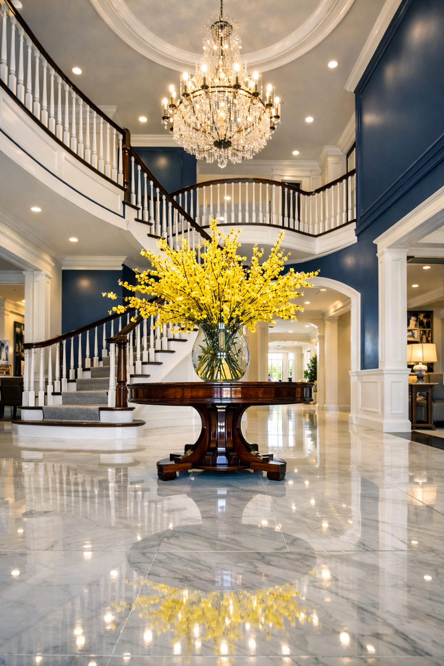 Elegant Newton foyer displaying high-end luxury house cleaning MA with polished white marble floors.