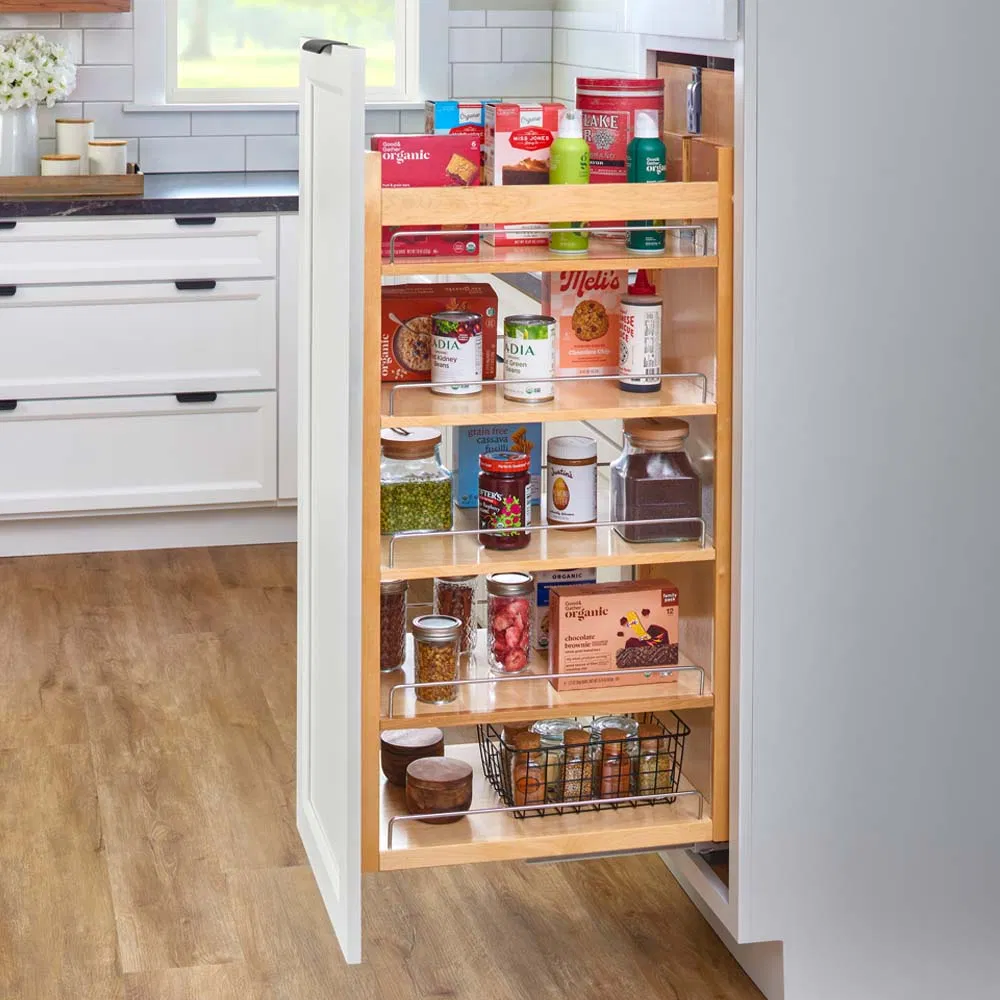 Custom pull-out pantry cabinet featuring maple wood shelves with metal railings.