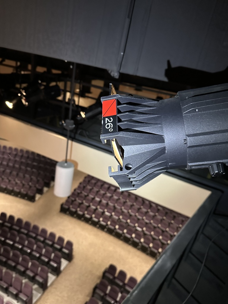 26-degree lens barrel on a high-output LED ellipsoidal fixture positioned for optimal front wash coverage in a church sanctuary.