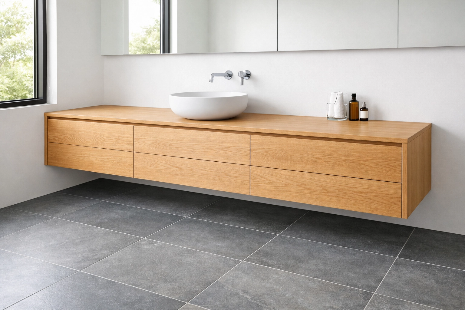 Modern floating rift-sawn oak vanity for easy cleaning in a Minnesota home bathroom.