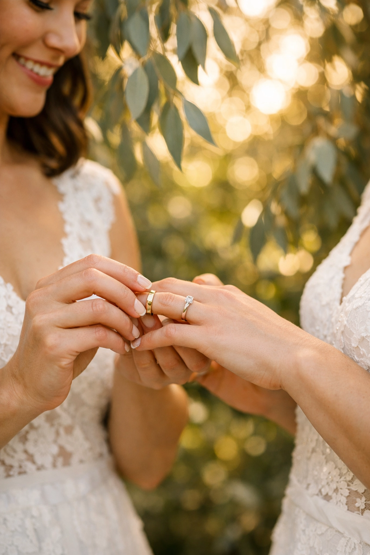 Close-up of a lesbian couple exchanging rings in a sunlit garden, reflecting a legal happy ever after.