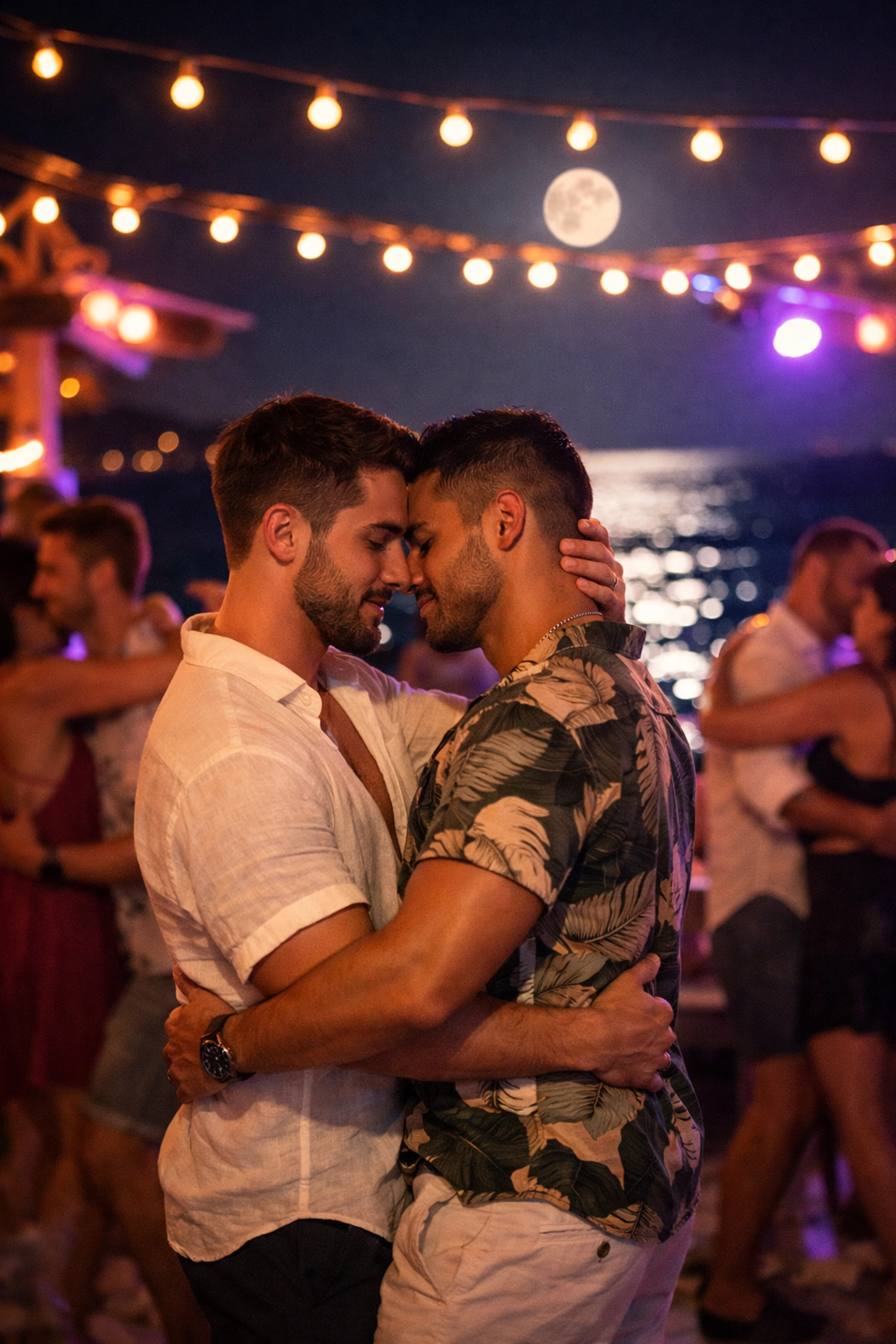Gay couple dancing at Mykonos nightclub under moonlight with sea views