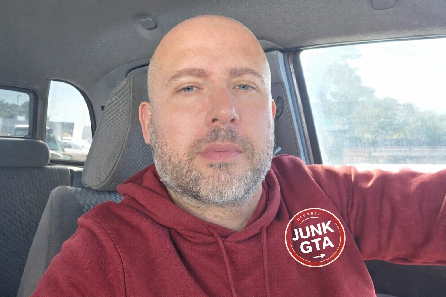 Roman K - Field Casual Owner Roman K in a red hoodie