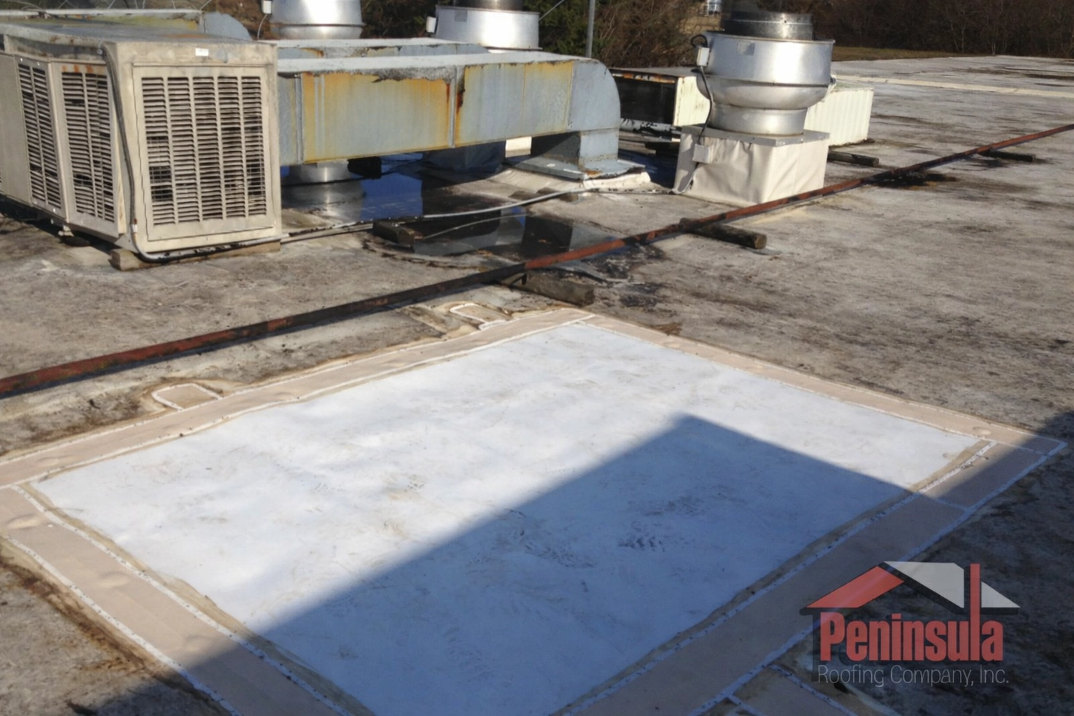 Commercial flat roof damage repair HVAC units and vent fans