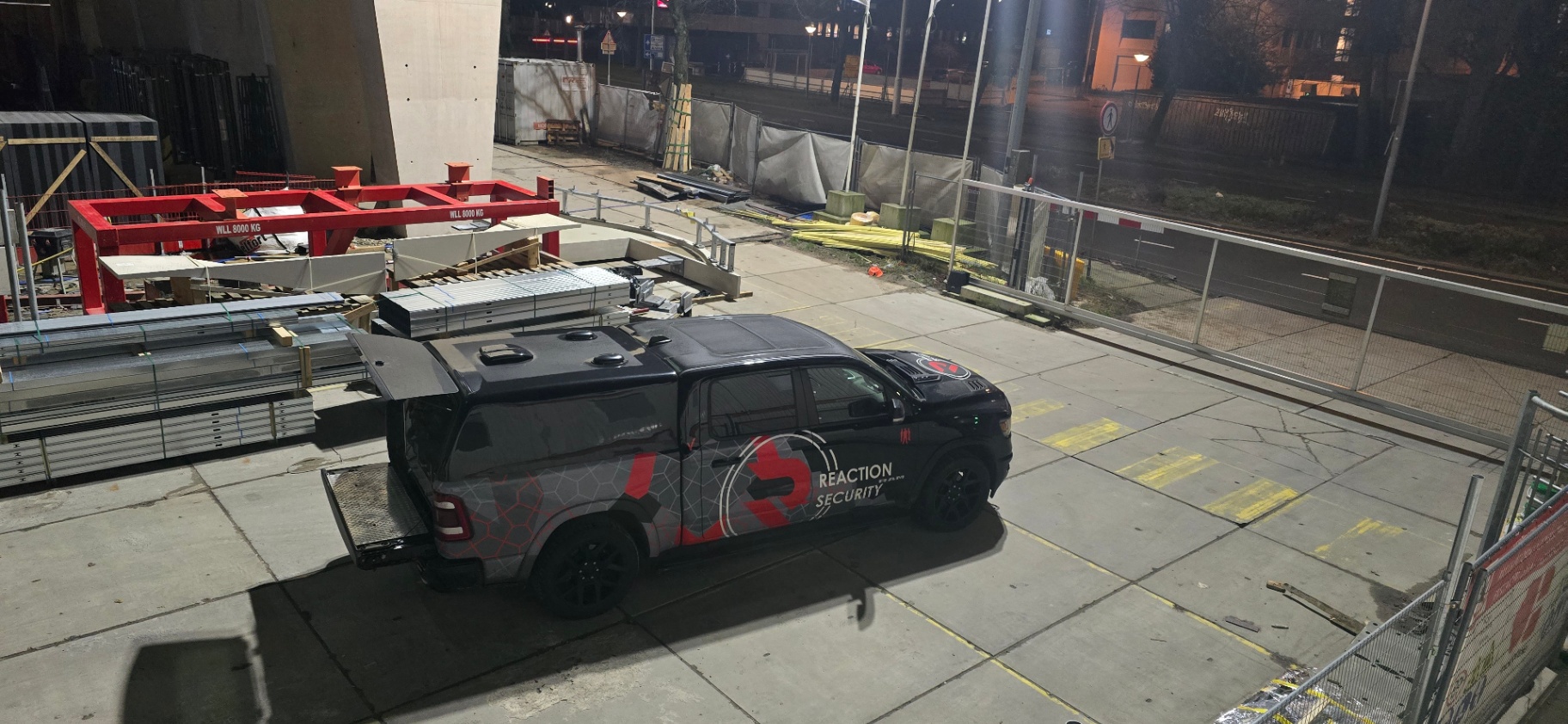Reaction Security B.V. patrol vehicle at construction site