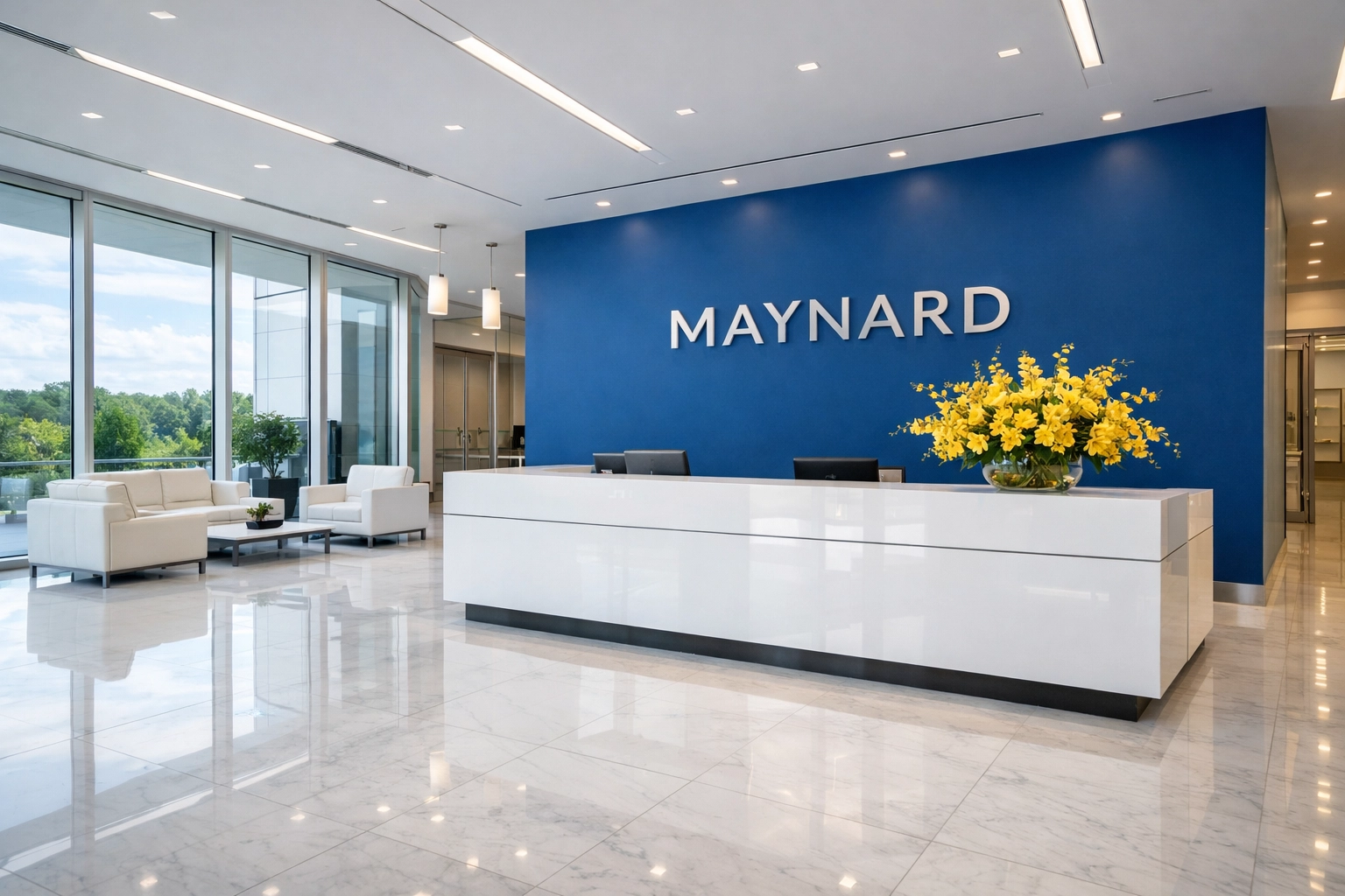 Gleaming marble floors in a professional Maynard lobby showcasing high-end commercial cleaning results.