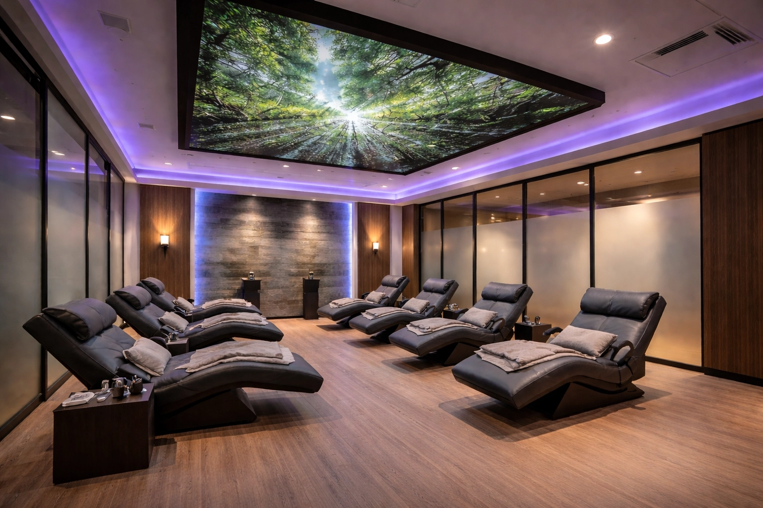 Immersive fitness recovery lounge with zero-gravity recliners and Digital SkyLites fitness center ceiling forest visuals in a gym wellness room