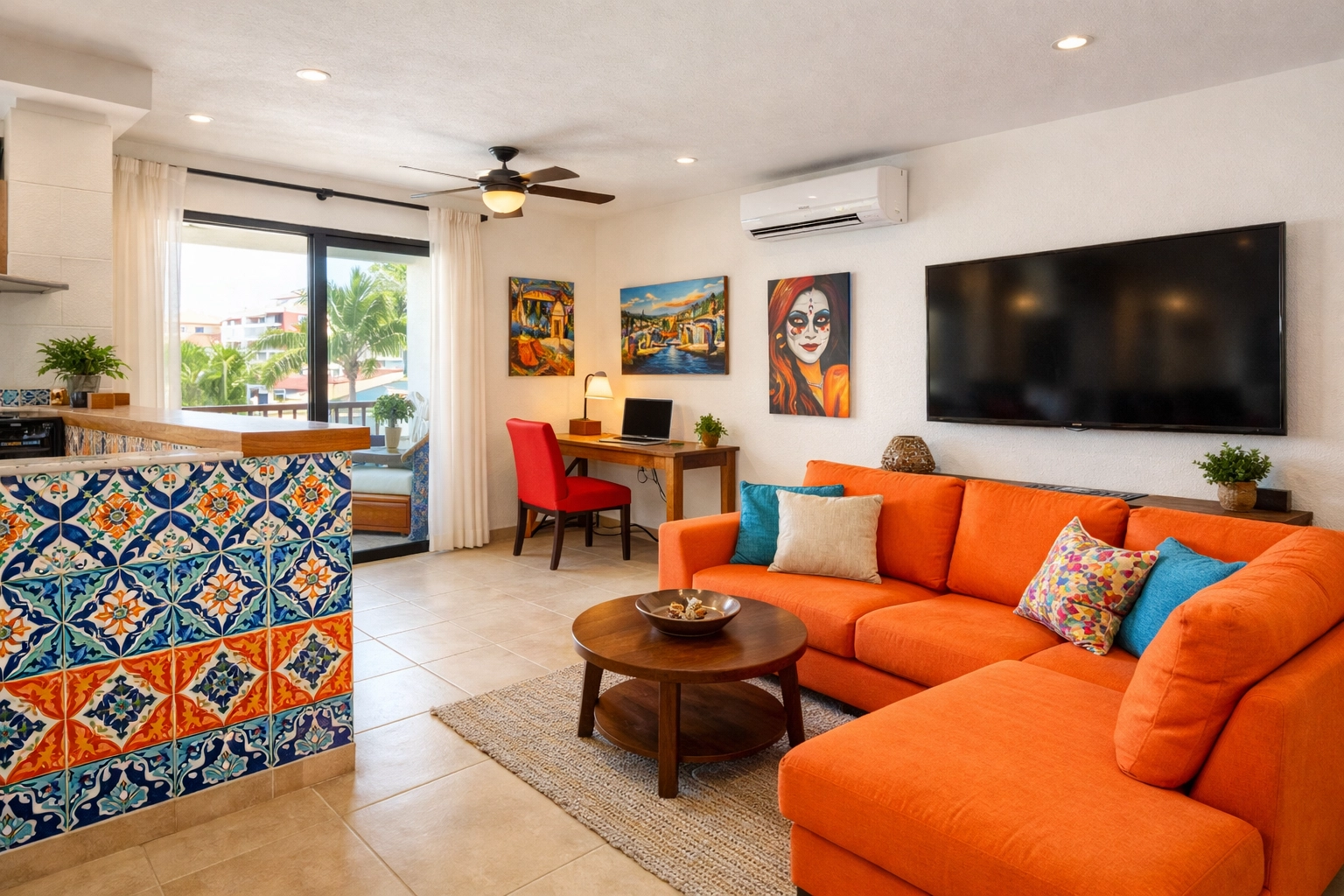 Modern Puerto Vallarta condo rental interior with workspace and Mexican tile accents