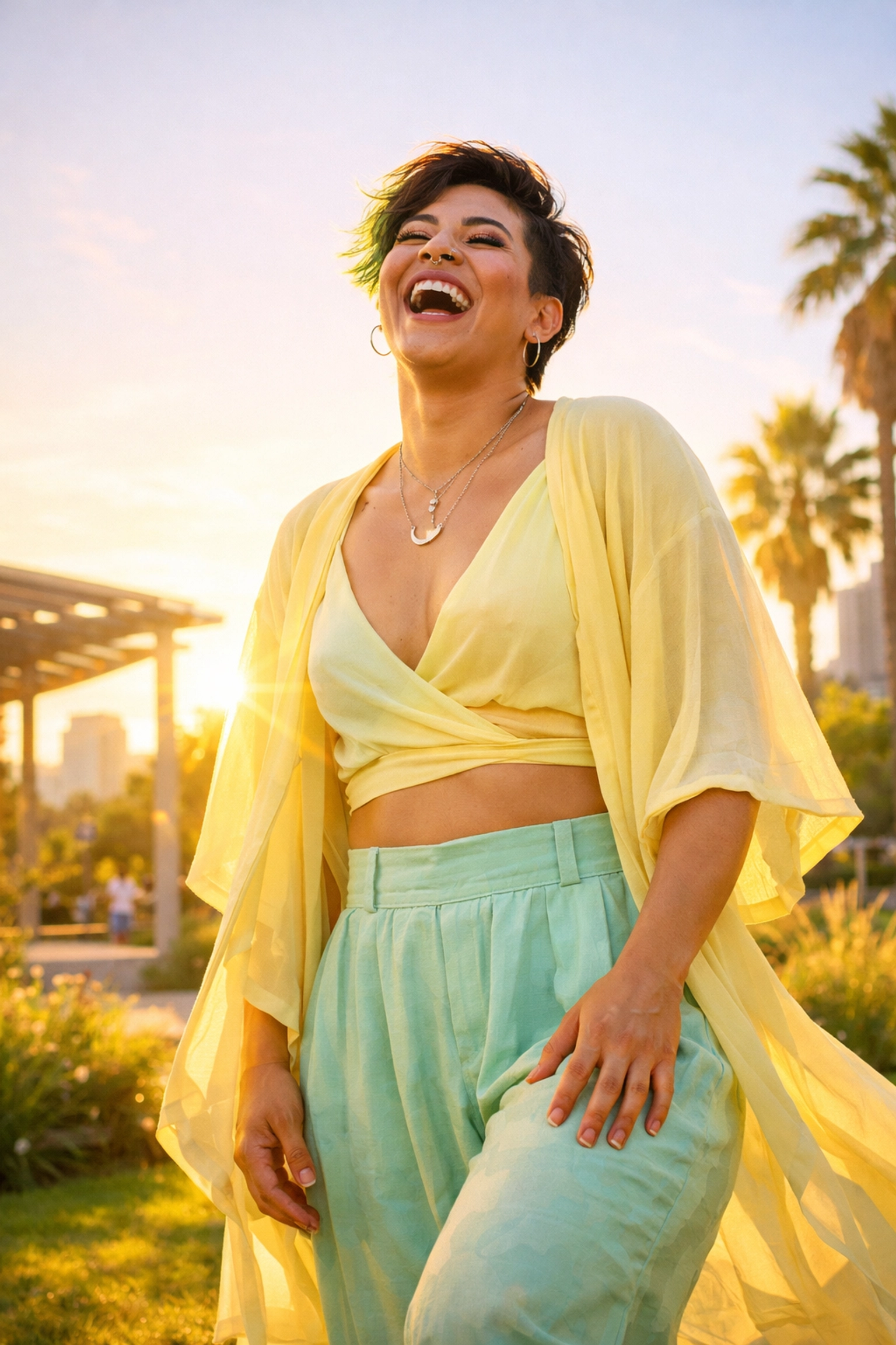 Joyful person experiencing gender euphoria outdoors, reflecting resilience and empowerment in LGBTQ+ counseling.