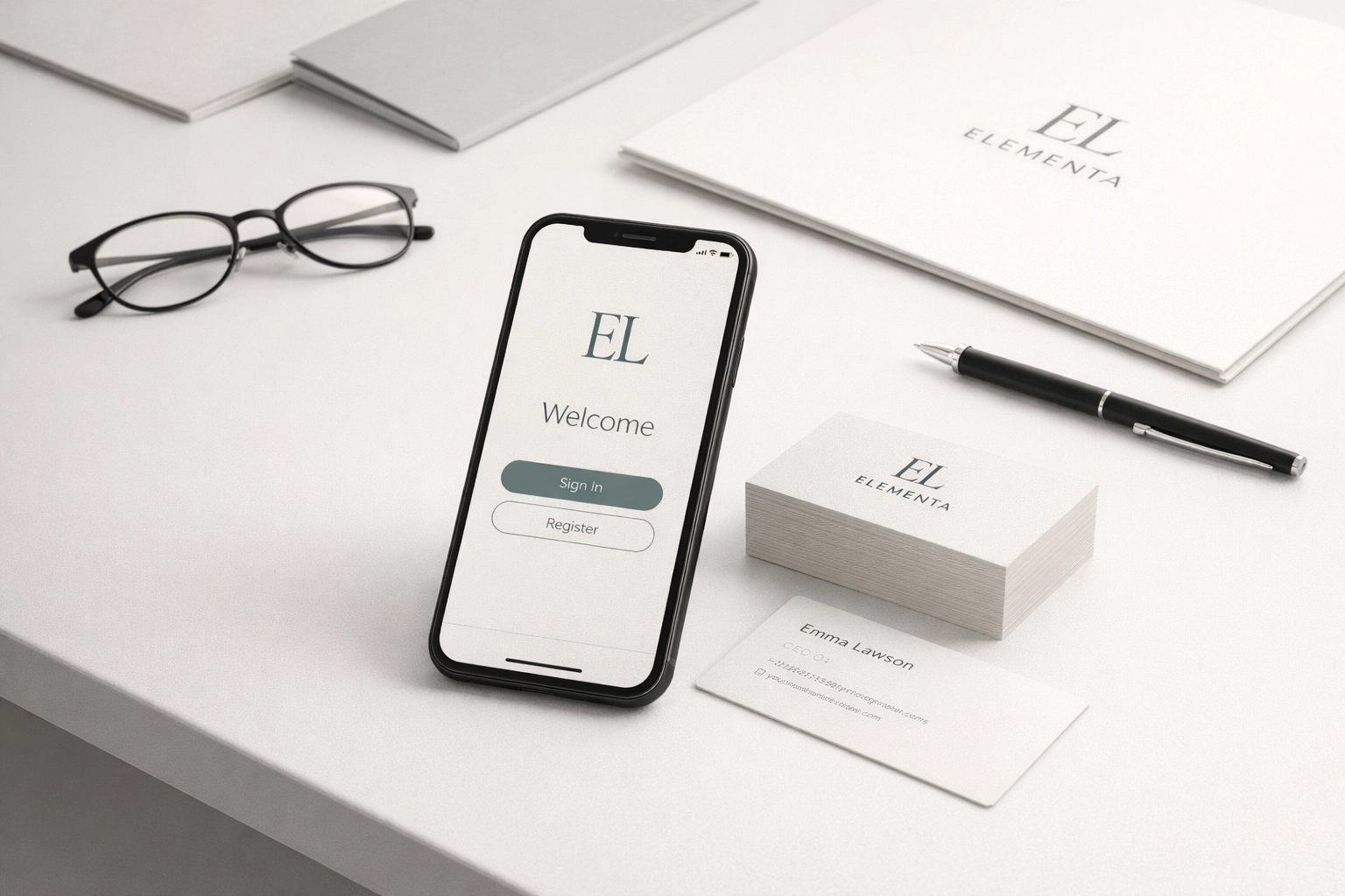 Consistent brand identity displayed on a smartphone, business cards, and professional office materials.