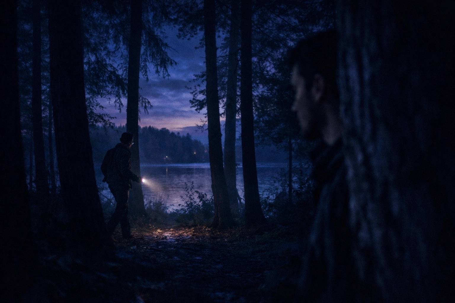 Suspenseful woods scene from Stranger by the Lake LGBTQ film ending