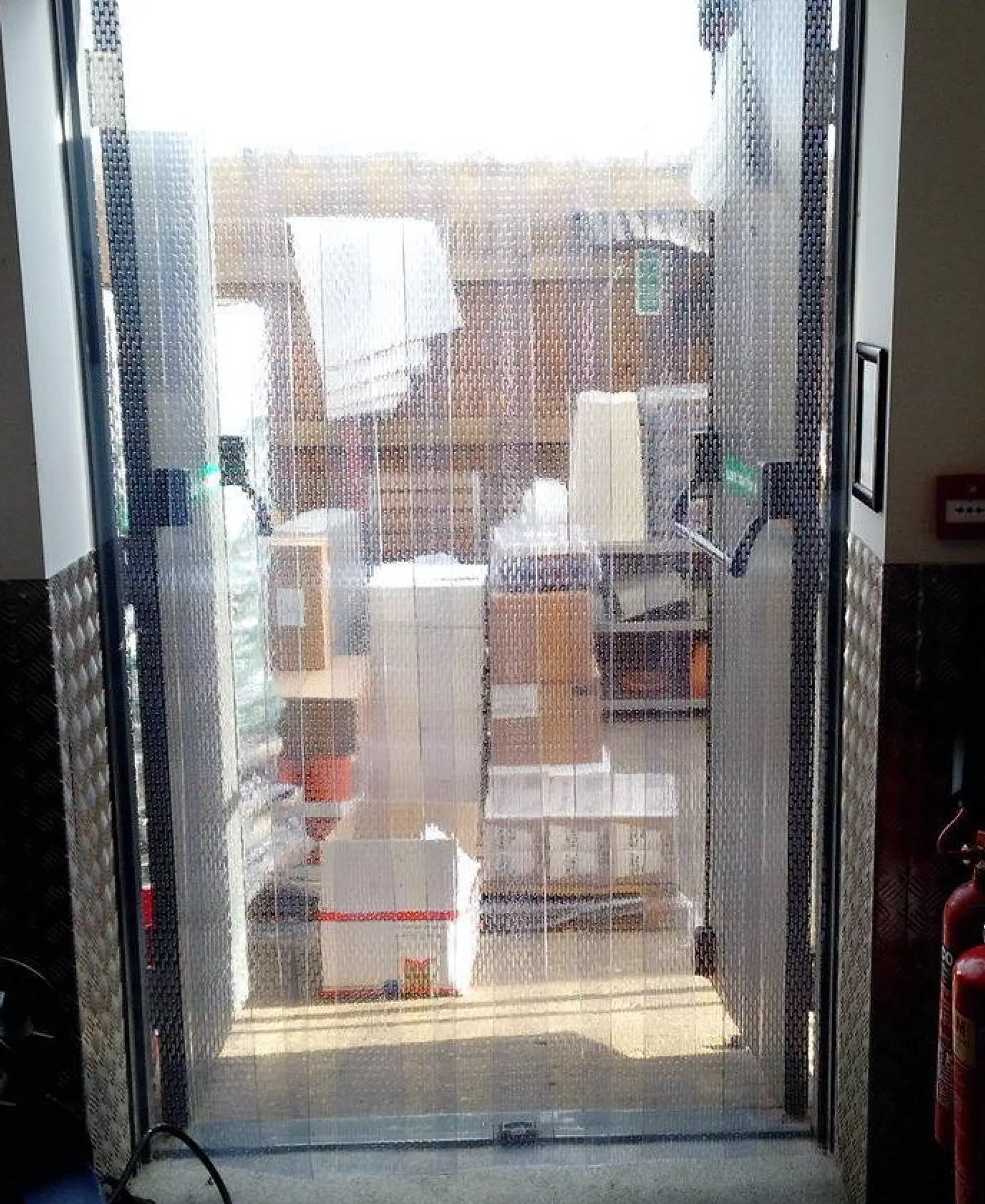 Heavy duty ribbed PVC strip curtain in a warehouse