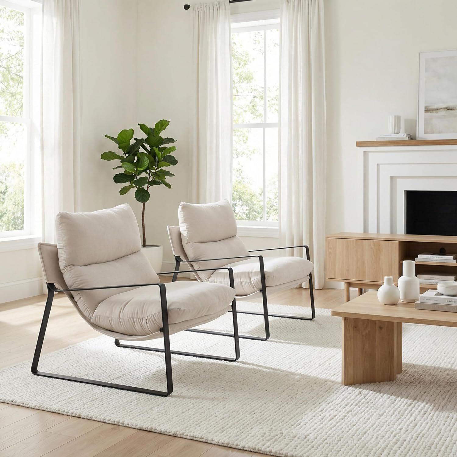 Bright, minimalist living room featuring two modern accent chairs, illustrating the clarity of a Visual Design Recommendation Plan.