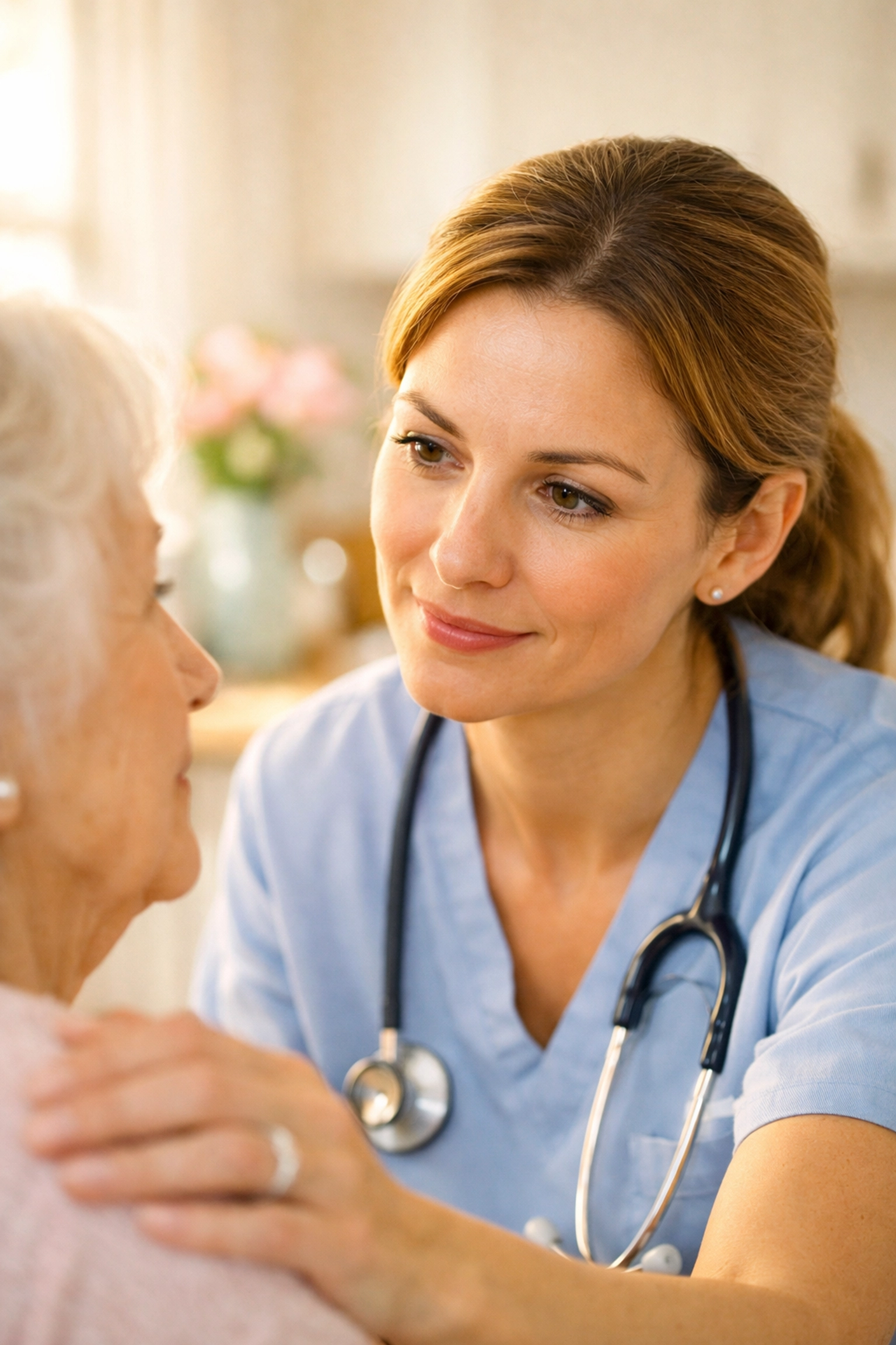 Dedicated private carer in Southampton providing personal care and checking on an elderly lady in her kitchen.