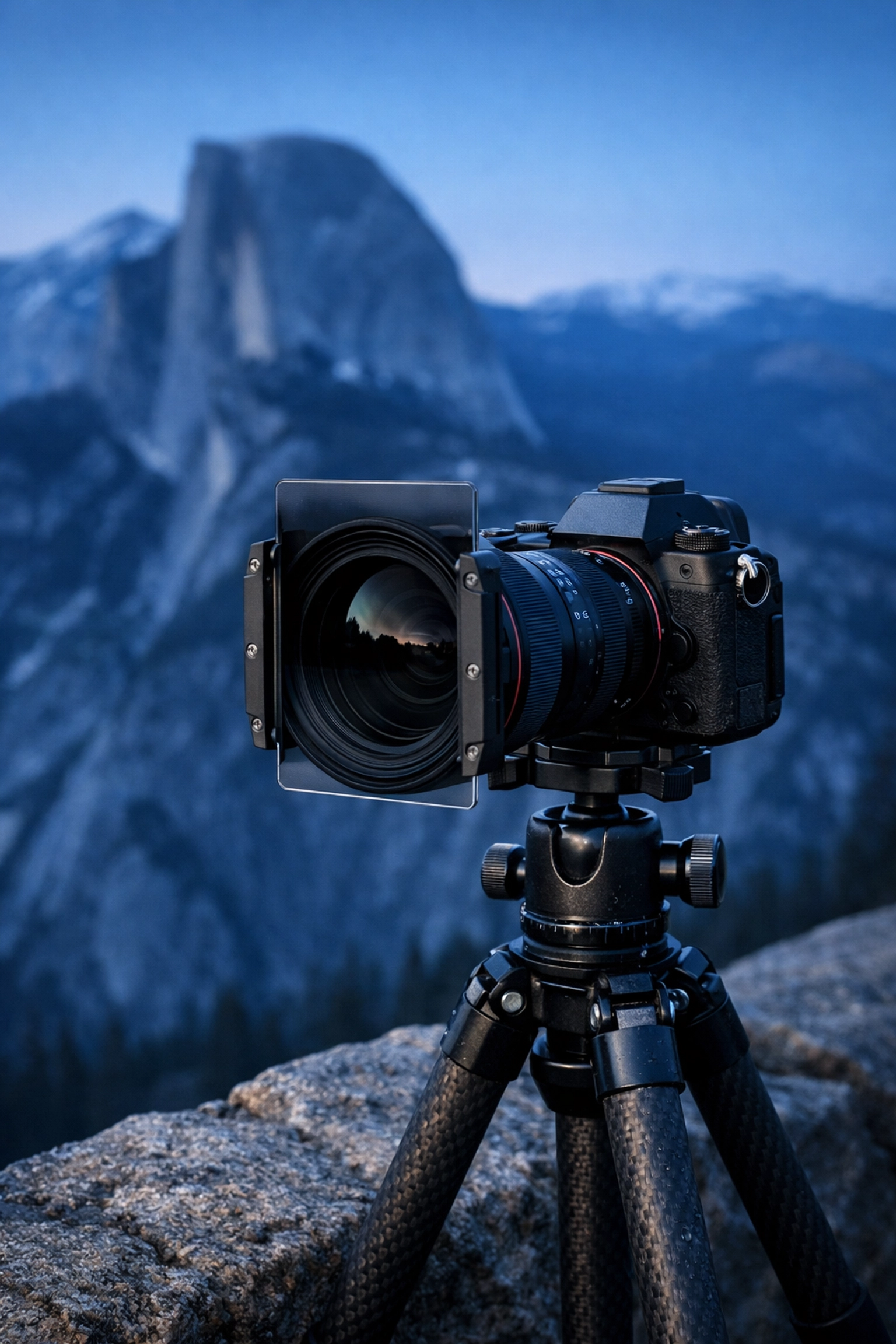 The Ultimate Guide to Photography at All 63 US National Parks: Everything You Need to Succeed 1 Professional camera on a tripod at Yosemite, a top landscape photography location for sunrise.