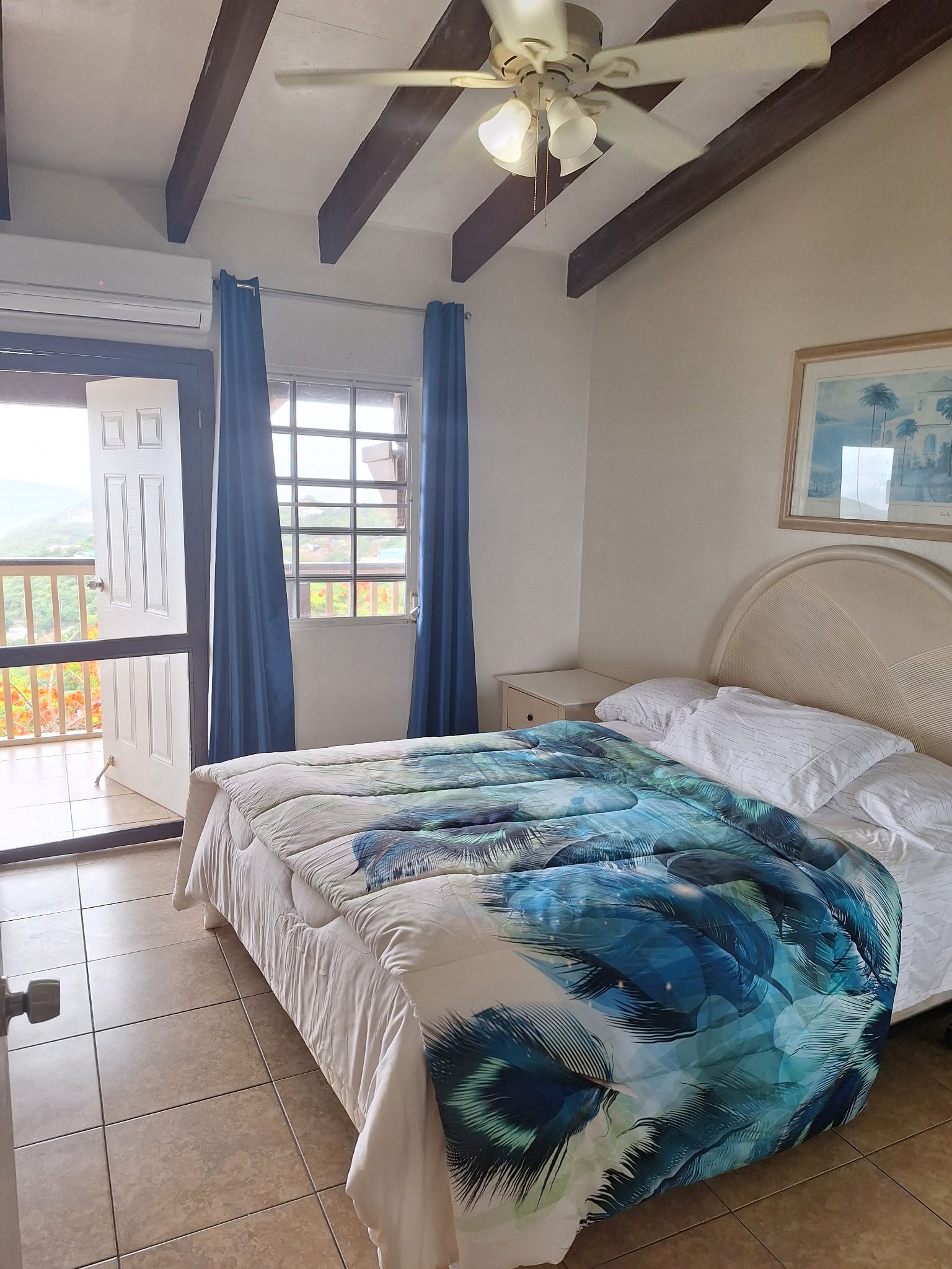 Bright guest room with harbor breeze