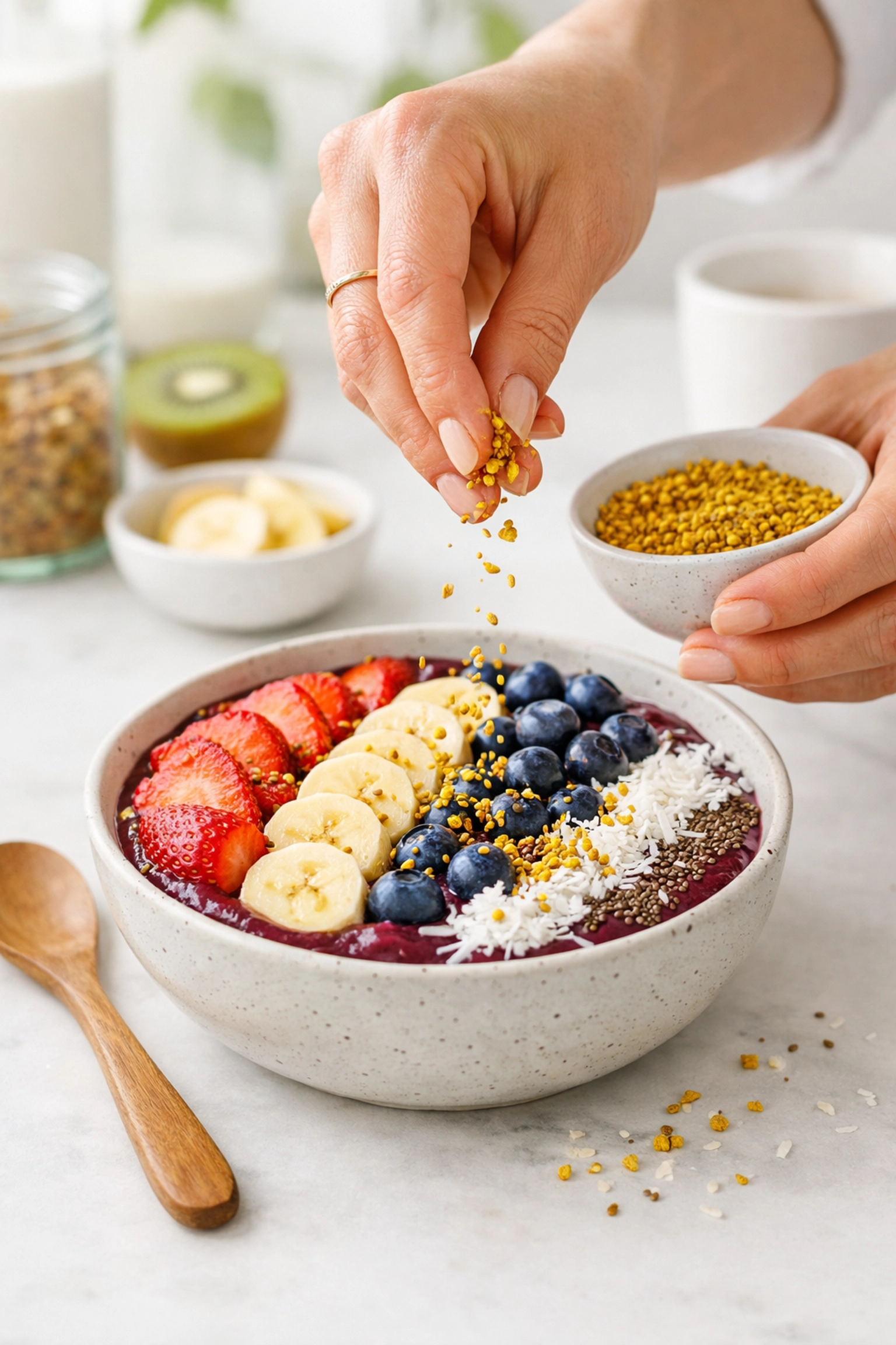 Adding bee pollen to a healthy smoothie bowl for enhanced digestion and energy.