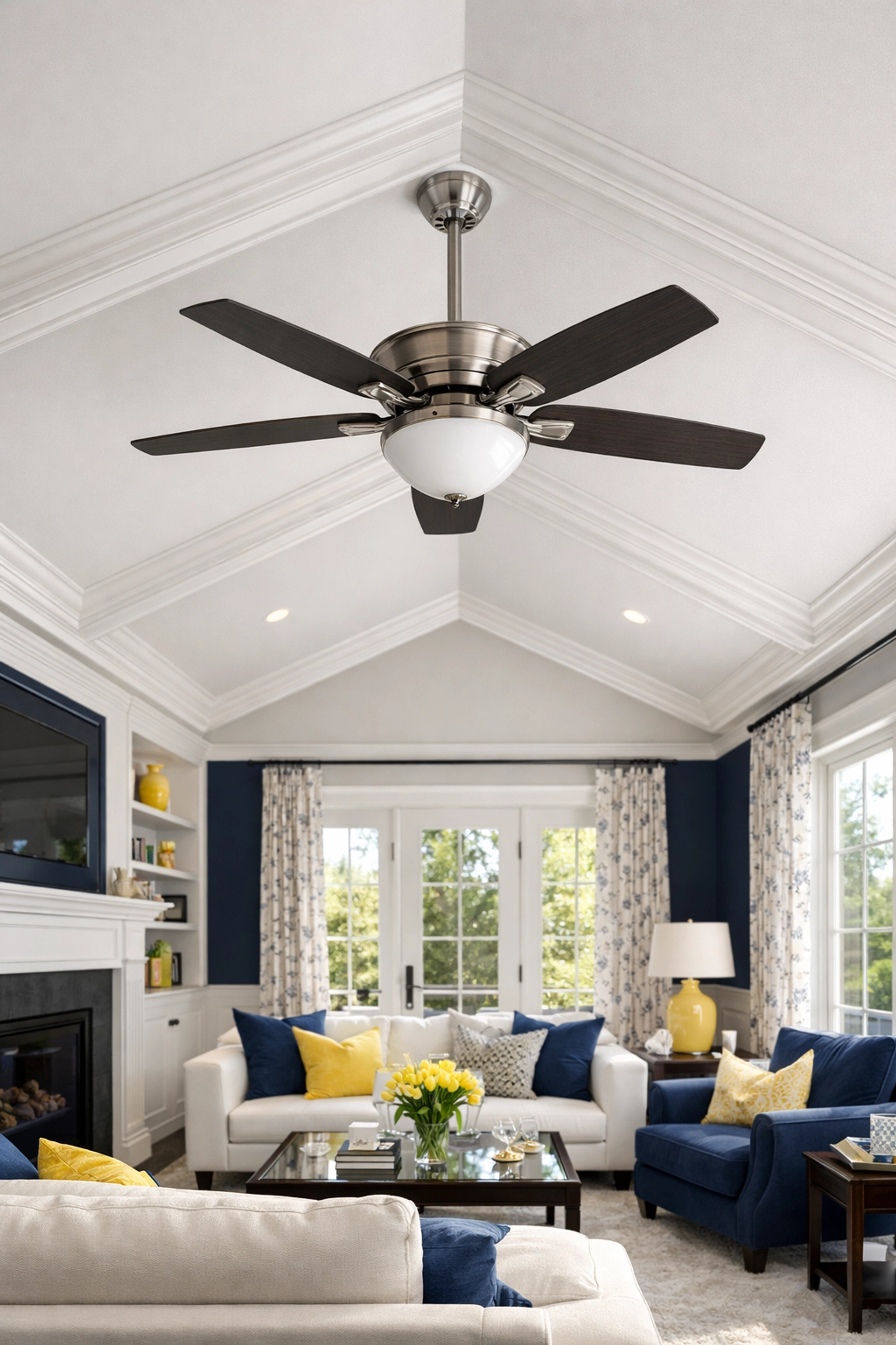 Deep cleaning Medway living room with a spotless ceiling fan and dust-free crown molding.