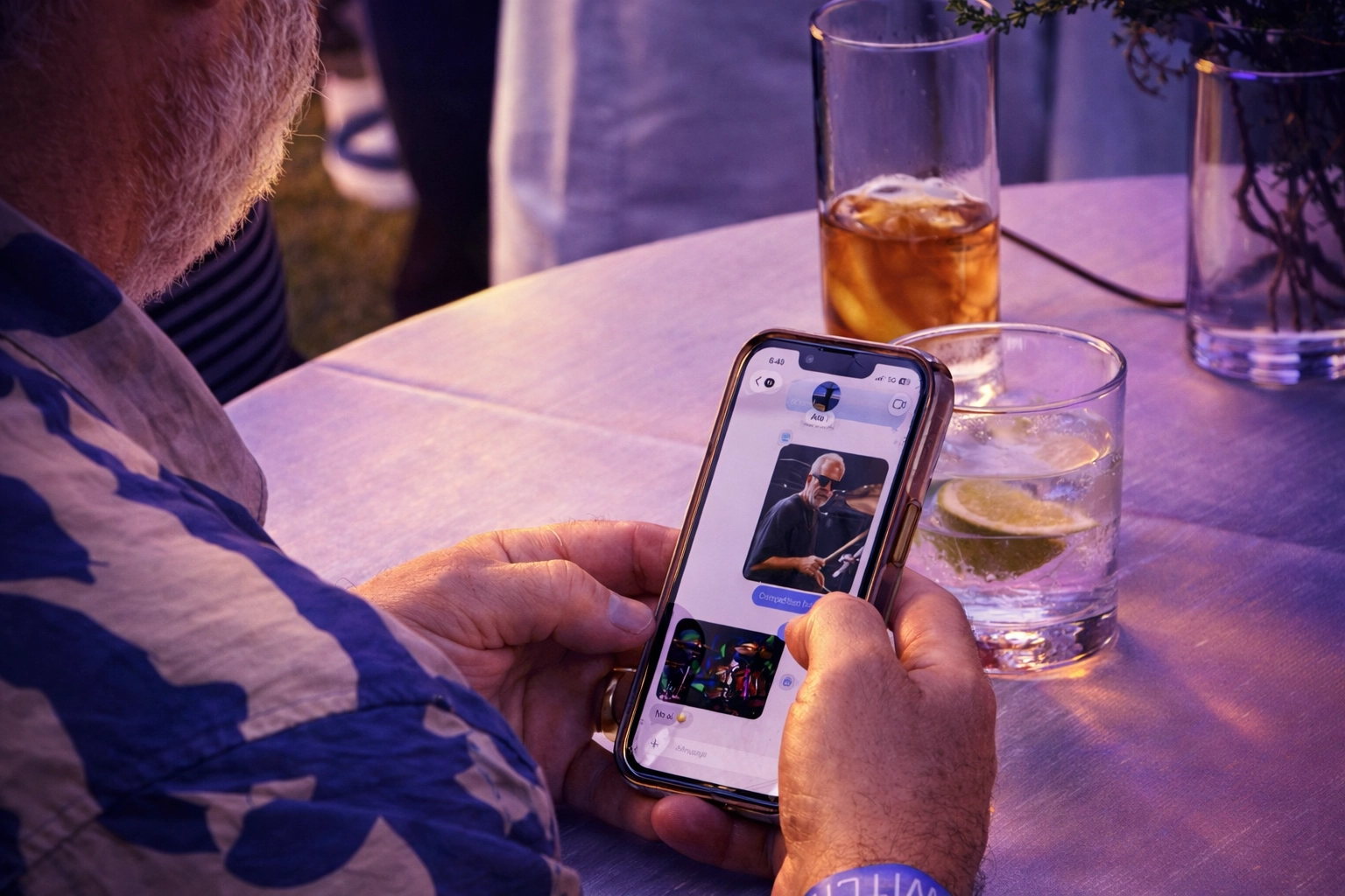 Guest texting their AI photo booth output in real time—instant sharing from a Ray-Ban brand activation experience.
