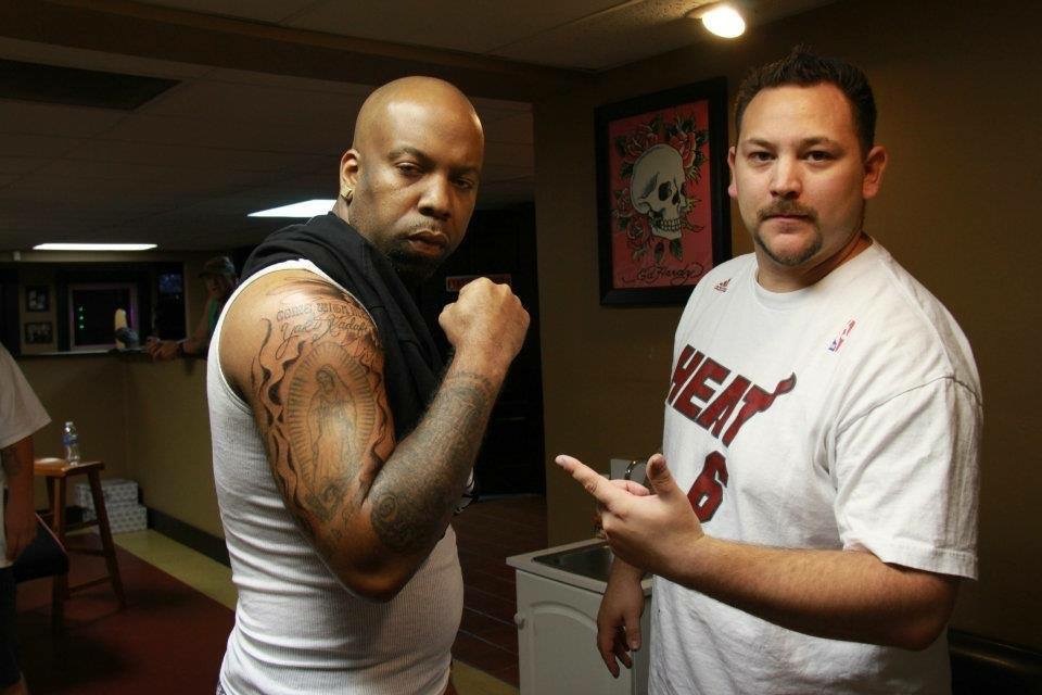 Client with Religious Portrait Tattoo at Farnam Street Tattoo