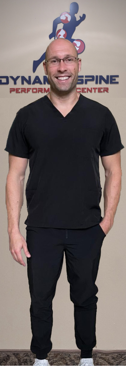 Stephen Ford Bio Picture 2026 Professional bio picture of Stephen Ford in black scrubs at Dynamic Spine and Performance Center.