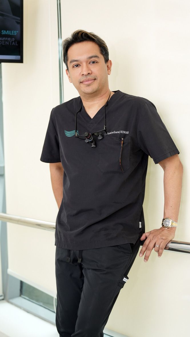 Dr. Samintharaj Kumar in clinical scrubs