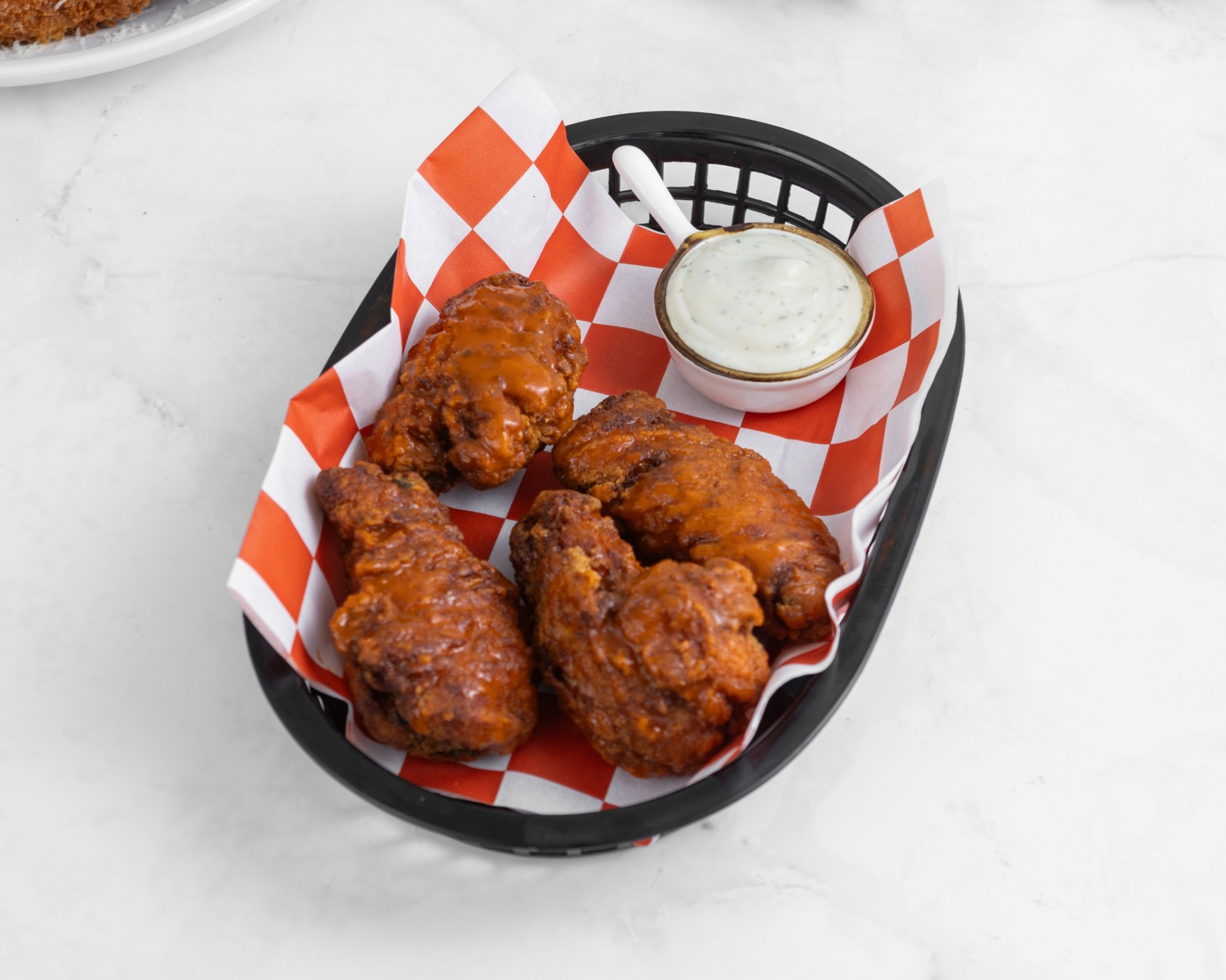 Basket of crispy buffalo chicken wings