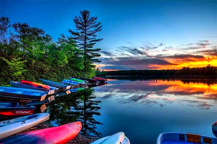 Colorful kayaks and canoes at Lake Naomi