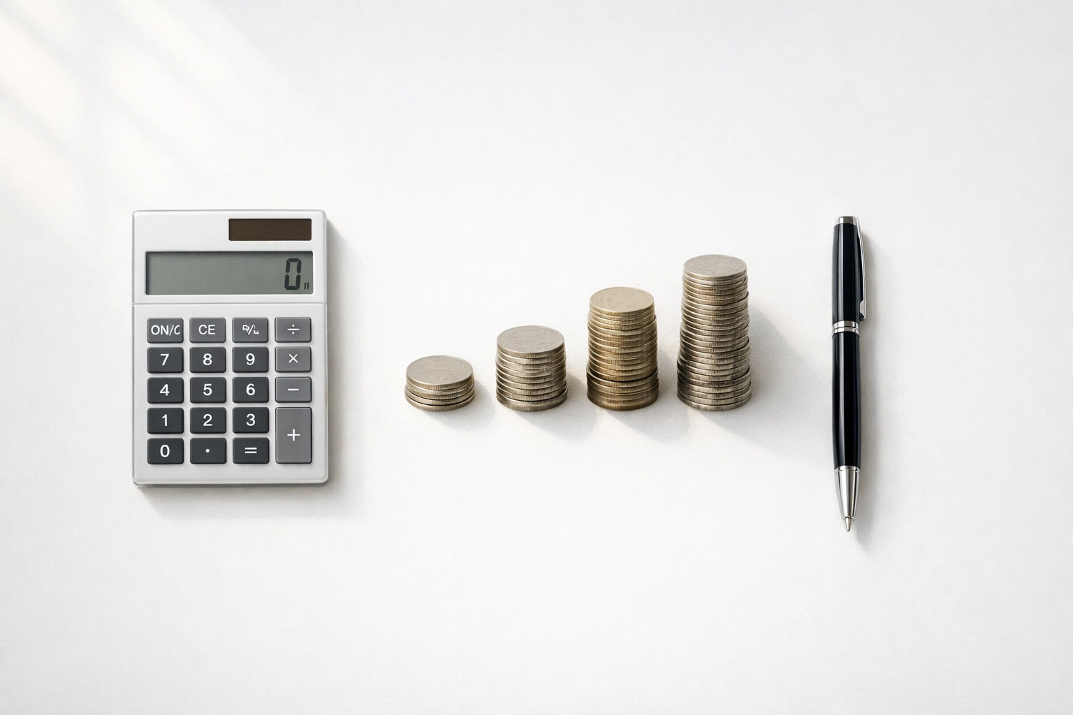 Calculator and coins showing cost comparison between service bureau fees and independent EFIN
