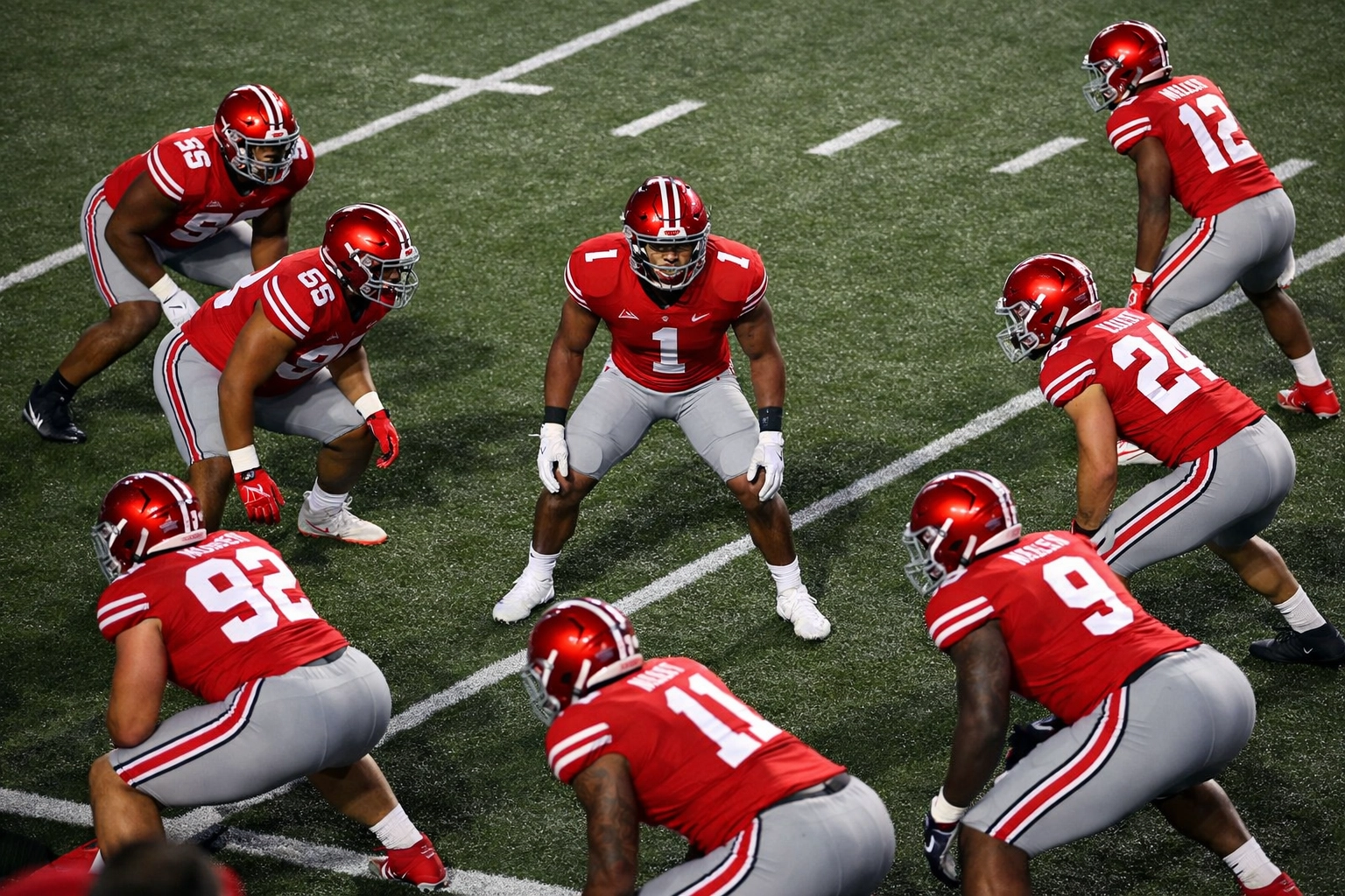 Ohio State Buckeyes defensive formation showing versatile secondary alignment under lights