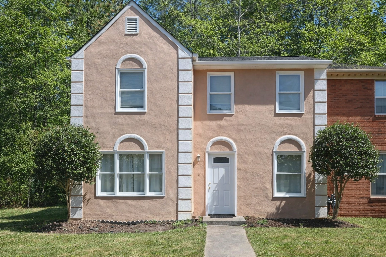 Professional renovation of an Atlanta townhouse exterior managed by PMI Beltline