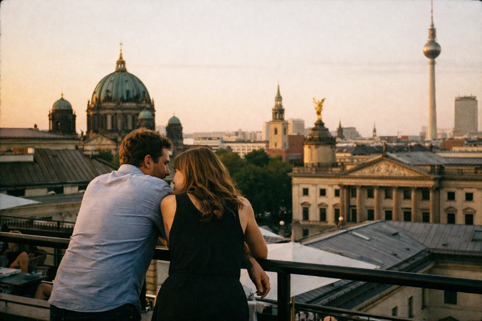 Hotel de Rome rooftop terrace vibe: calm summer evening and a skyline that feels like a soft reset.