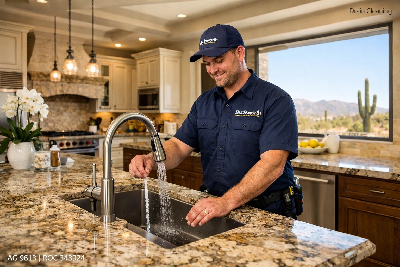 Licensed plumber testing sink drainage in a Fountain Hills kitchen to ensure pipes are clear and functional.