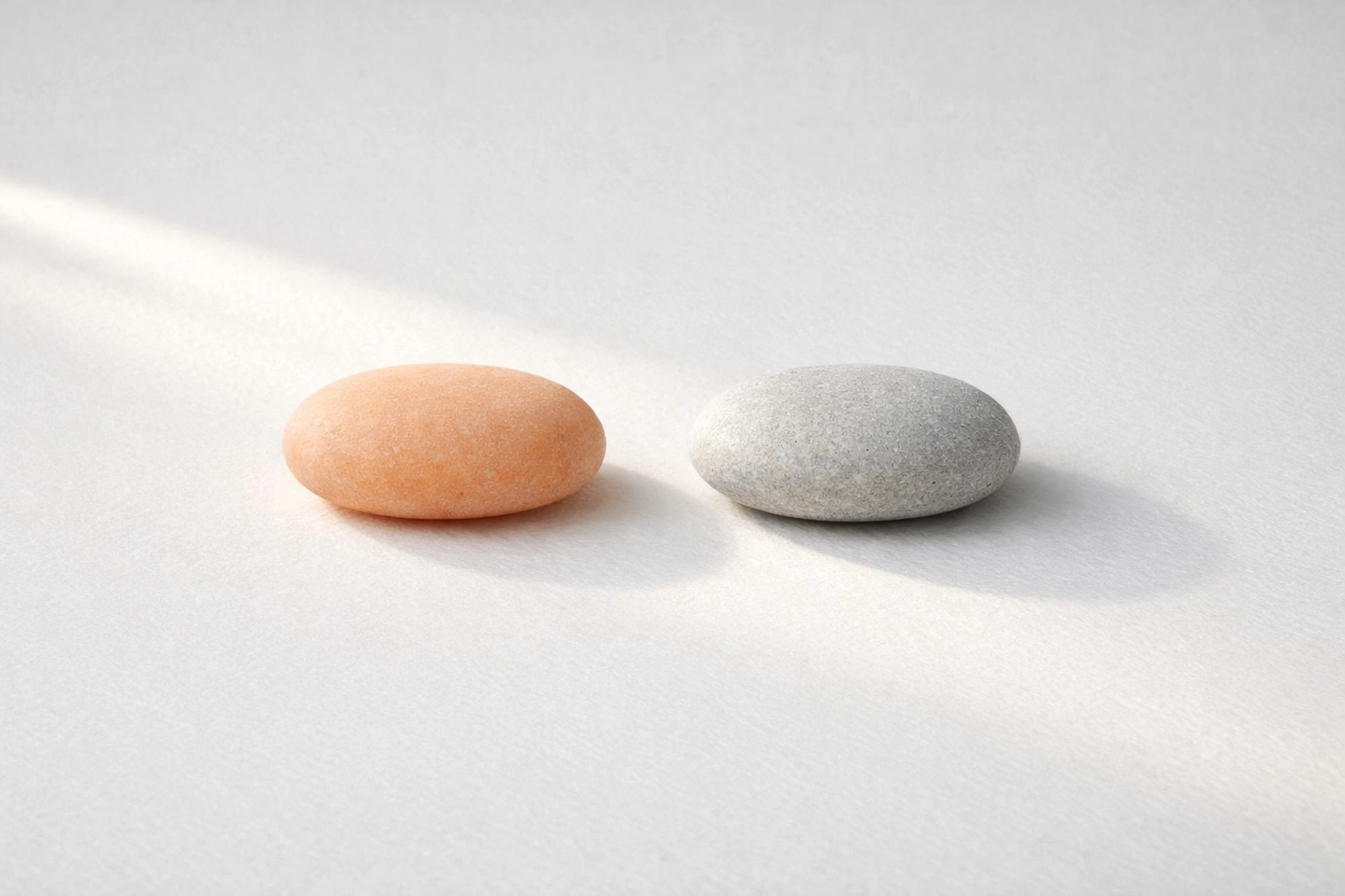 Minimalist stones illustrating the optimization of a creative bio link tool through simple choices.