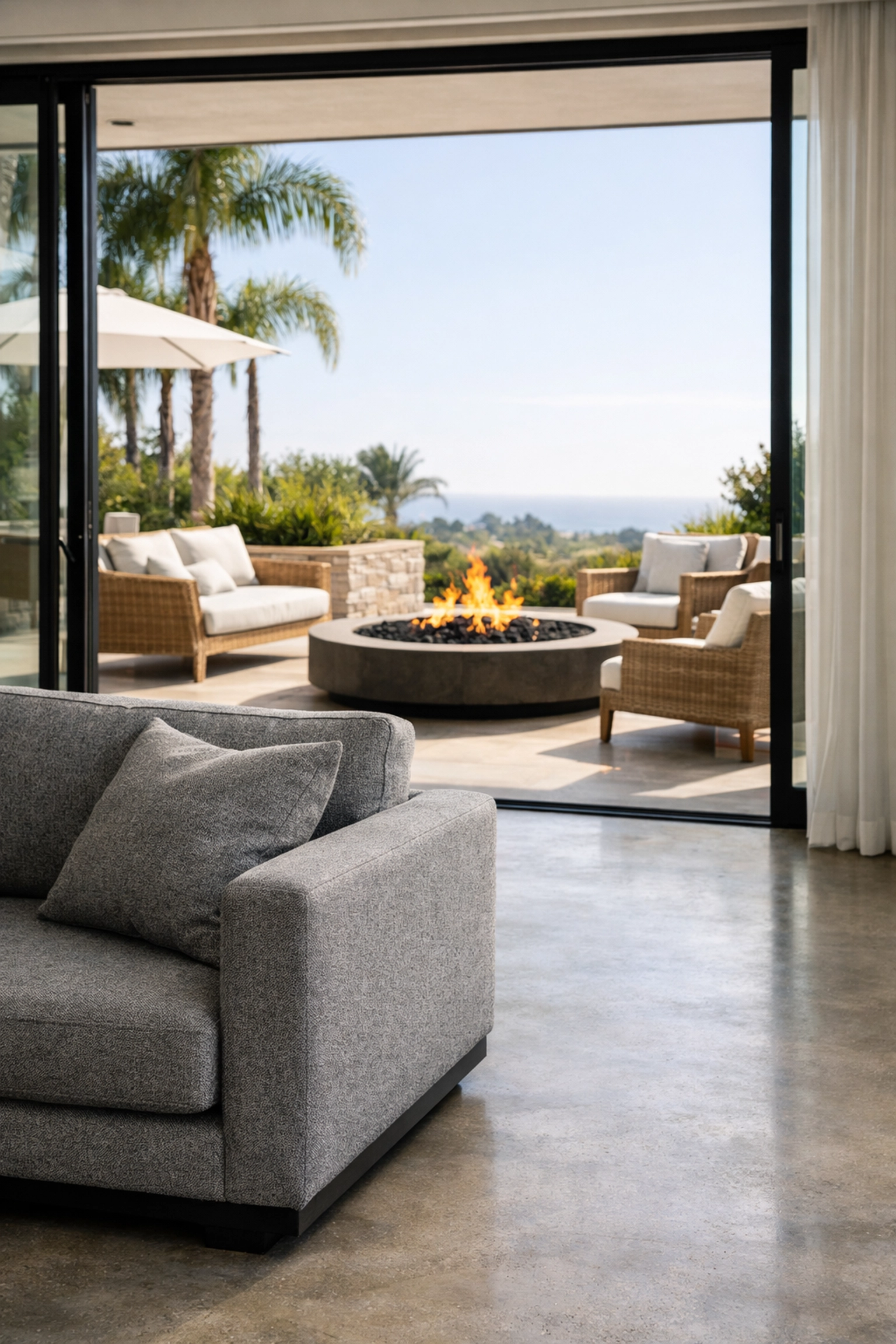 Durable performance fabric sofa in a modern San Diego villa with an indoor-outdoor patio