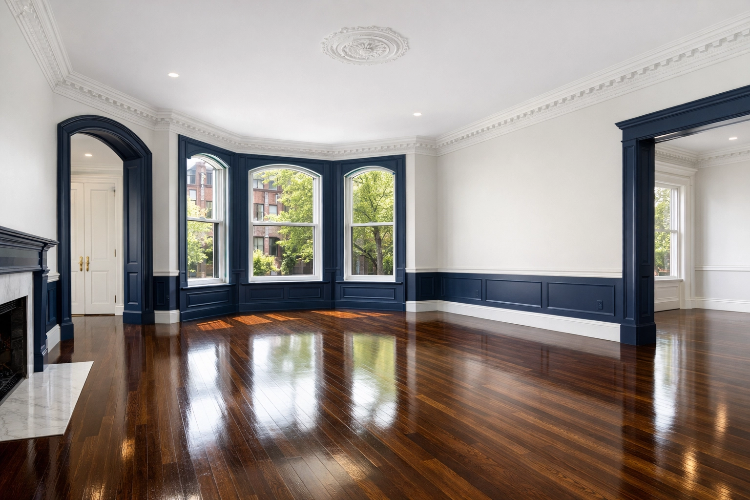 Sparkling empty Boston brownstone living room following a professional move-in cleaning service.
