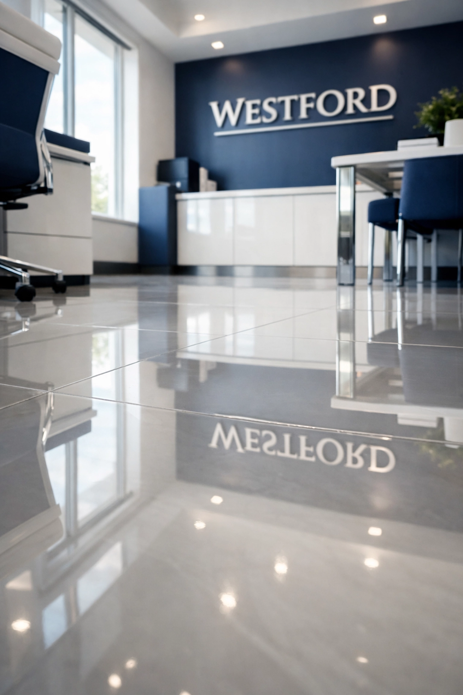 Pristine, high-gloss tile floors in a Westford corporate suite maintained by commercial cleaning Westford experts.