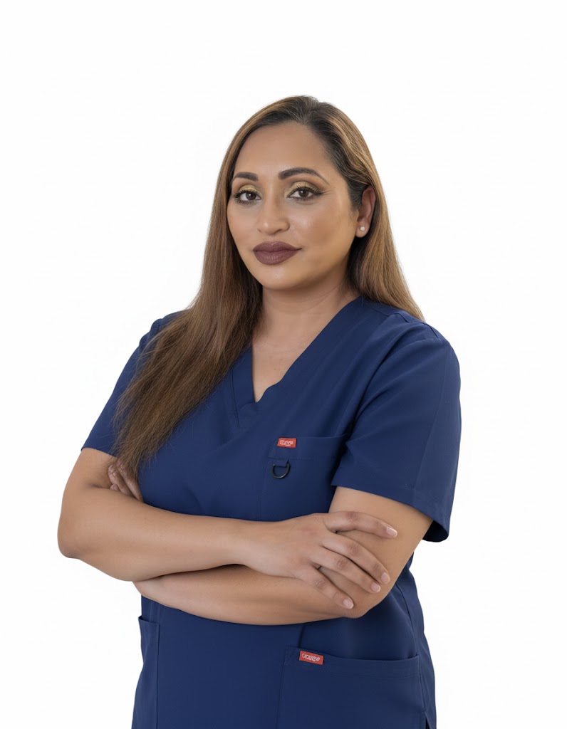 Doctor in navy blue medical scrubs at Bella Medica Aesthetics