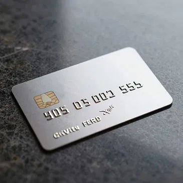 Sleek metal credit card representing modern financial tools