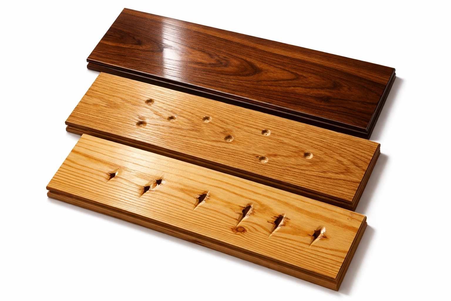 Different hardwood floor species showing stiletto heel damage on walnut, oak, and pine