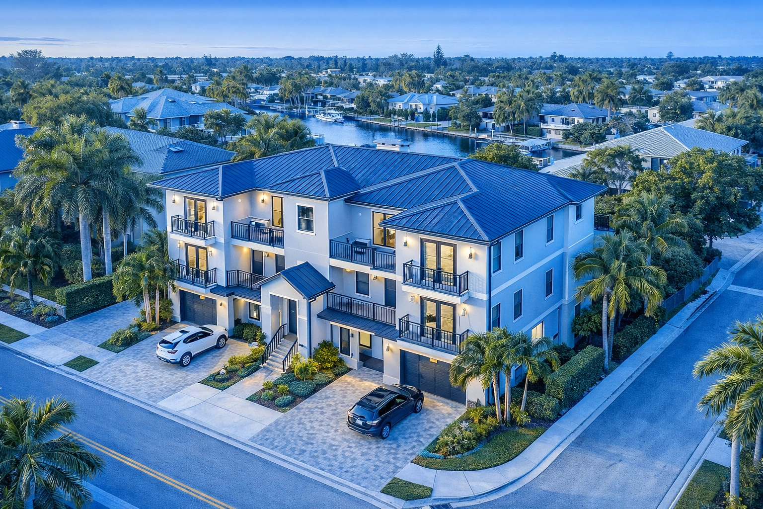 Modern multi-family duplex in Lehigh Acres Florida with landscaping and separate unit entrances