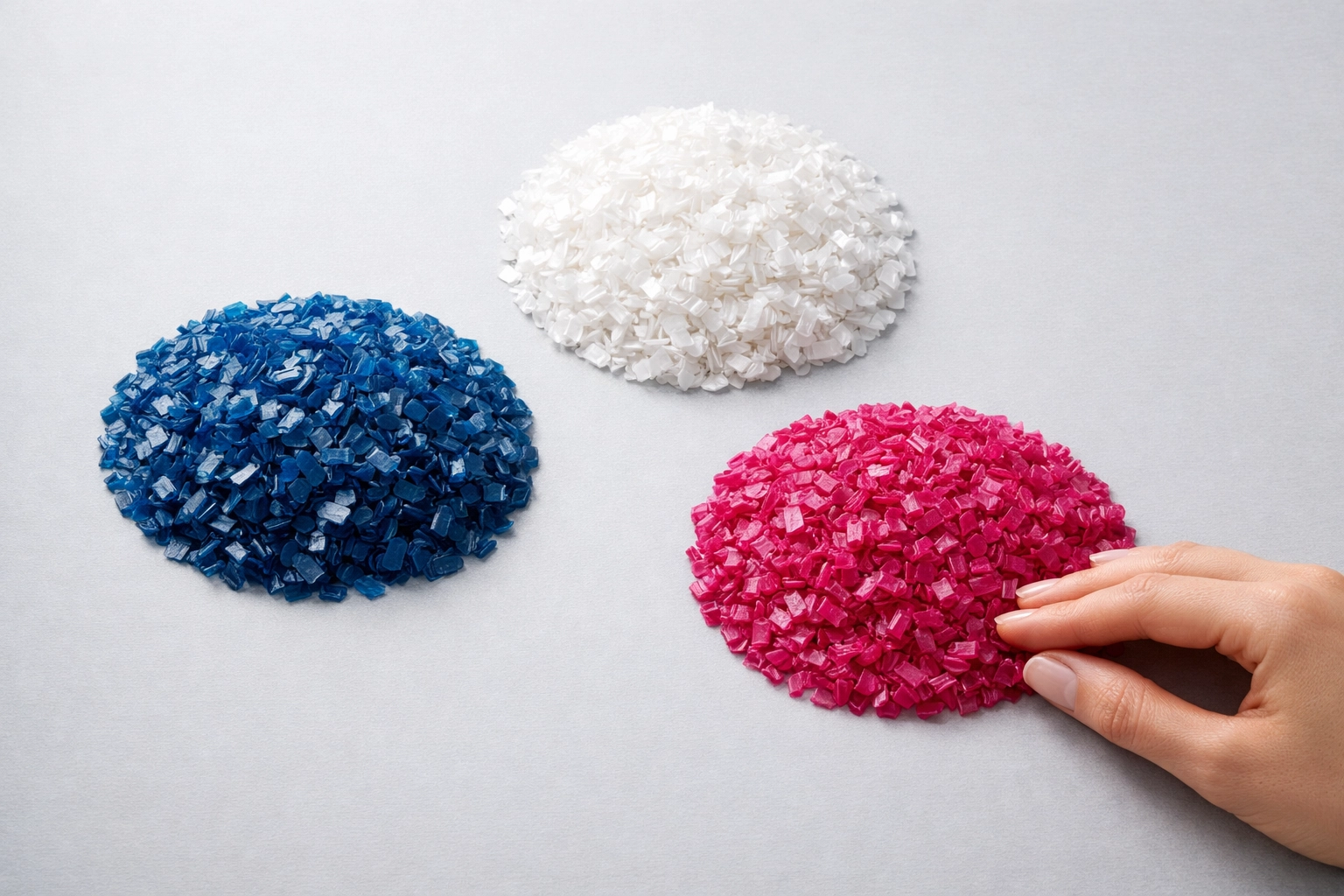 Sorted 100% Australian recycled plastic flakes showing material purity for sustainable panel manufacturing.