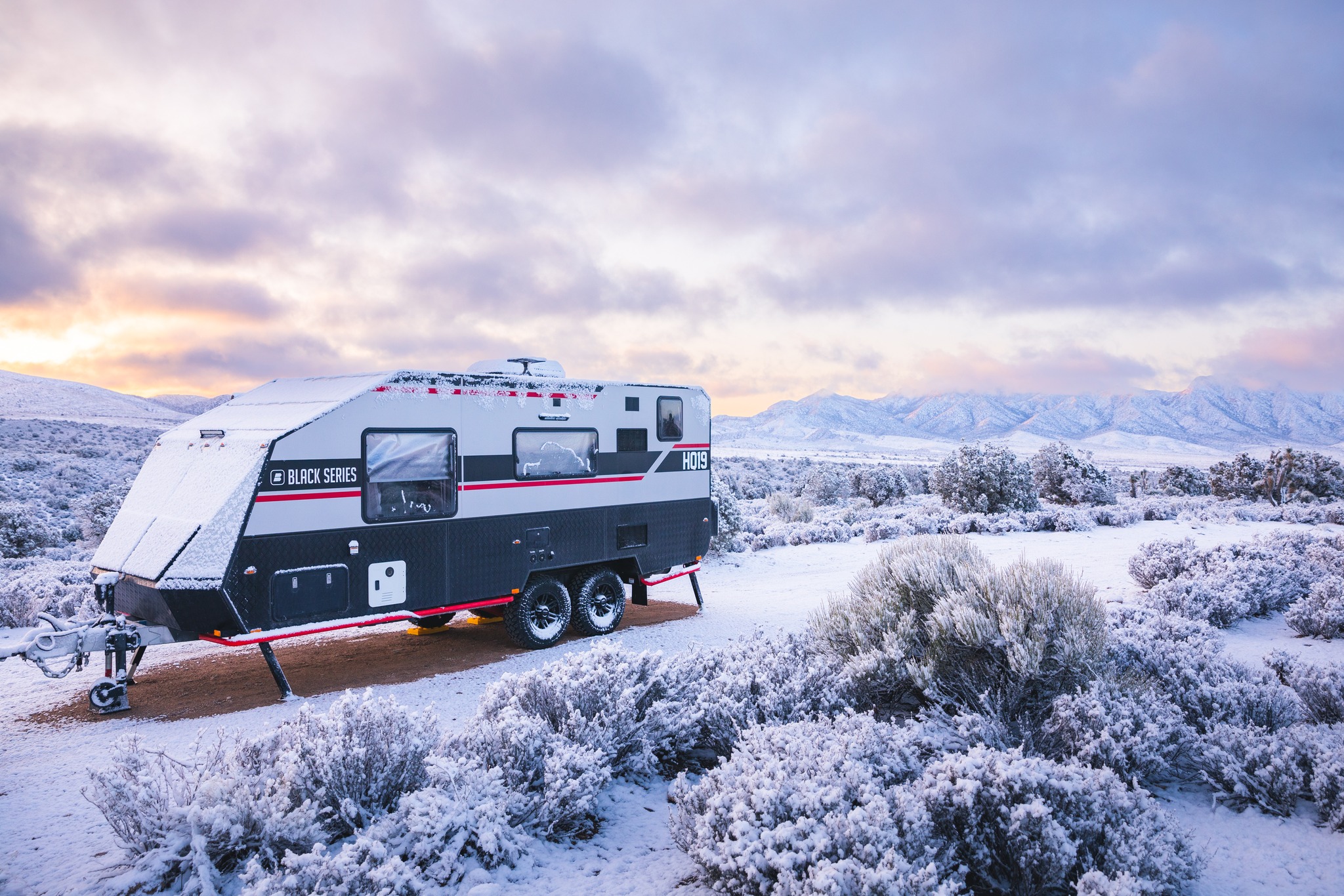 BlackSeries HQ19 off-road travel trailer in snowy conditions