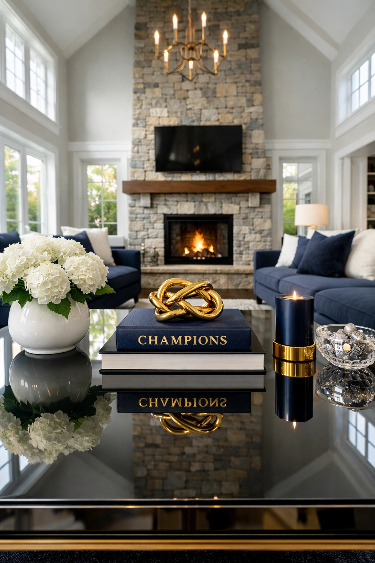 Spotless luxury living room in Foxborough featuring a stone fireplace and clean designer furniture.